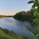 Vue sur la rivière Chaudière près du pont dans la municipalité de Scott, coucher du soleil.